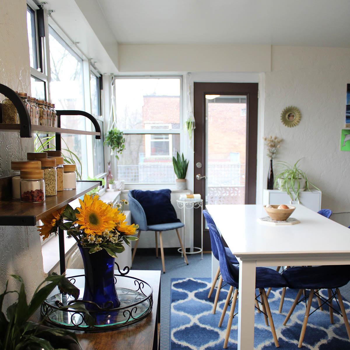 Photo of a residence hall apartment, decorated in blues and yellows